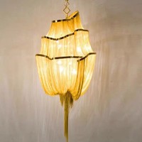 Luminaire à chaîne postmoderne et moderne pour hôtels, escaliers duplex, salons, salles à manger, magasins de vêtements, en aluminium avec pampilles