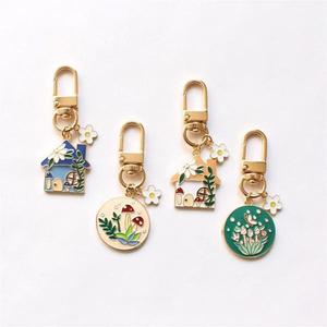 Vintage Pastoral Fresh Garden Style Flores Villa Cottage View Metal Colgante Bolsa Colgante Adorno Esmalte Aleación Colgante Llavero - Product Image 1