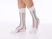 Nouvelles chaussettes habillées d'été pour hommes, jetables, antibactériennes, soyeuses et transparentes, avec logo sous le pied, idéales pour le travail et les affaires.