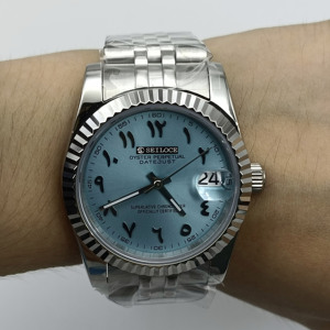 Reloj mecánico con caja de acero inoxidable de 36/39 mm, esfera con números arábigos y diseño de diente de perro, equipado con movimiento NH35. - Product Image 4