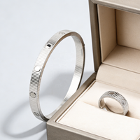 Nouveauté 2026 – Ensemble bracelet et bague de luxe en acier inoxydable plaqué or 18 carats, style punk, couleur argent et or rose