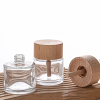 Vente en gros de 50ml de désodorisant clair pour voiture bouteille vide roseau rond diffuseur de voiture bouteille en verre