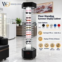 Vitrine rotative sur pied en acrylique transparent à deux niveaux avec éclairage LED pour cosmétiques, parfums, lunettes et modèles dentaires