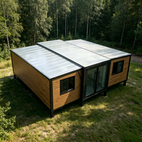Maisonnette préfabriquée moderne de luxe en acier extensible, résistante à l'eau et au feu, utilisable comme villa, salon, appartement ou chambre.