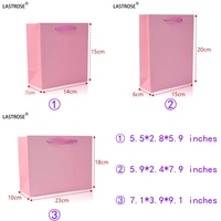 Prix d'usine Sac en papier cadeau rose pour bébé Sacs en papier de luxe de marque privée en gros