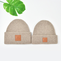 Parche de cuero con logotipo personalizado, gorro de punto de lana cálido con puños, gorros de invierno Unisex, gorro para mujeres y hombres