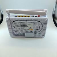 Routeur Wi-Fi Xpon F660 Blanc avec 1GE+3FE+1TEL+1USB+2.4G Double Bande ONT 741 Garantie 1 An pour Utilisation FTTH