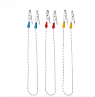 Outils dentaires Clip écharpe écharpes tabliers Clip bavoir Clip perles de fer Clip jetable en acier inoxydable pour fournitures de laboratoire dentaire