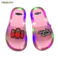 Nouvelles sandales d'été pour enfants, claquettes lumineuses LED pour garçons et filles, motif visage souriant, design à bout ouvert, en PVC, pour la plage