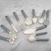 Éplucheurs professionnels en acier inoxydable et céramique, personnalisables OEM, pour la vente en gros, manuels, faciles à nettoyer, durables, pour fruits et légumes, gadgets de cuisine