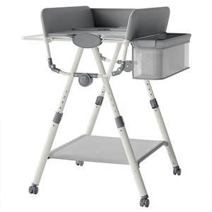 Produits pour bébés en gros, fournitures, tables à <span class=keywords><strong>langer</strong></span> pour bébés, designs pliables, roues, hauteur réglable, station de change de couches portable pour bébés - Product Image 3