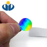 Autocollants circulaires holographiques noirs personnalisés, petites étiquettes rondes laser sur feuilles