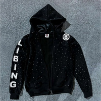 Sweat à capuche zippé surdimensionné en molleton de coton, avec broderie de motifs, effet vieilli, orné de strass et de cristaux, en satin