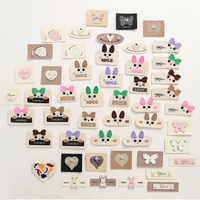 Erkoumi vente en gros 2025 nouveauté étiquettes en tissu de dessin animé mignon patchs tissés polyvalents pour enfants sacs chapeaux vêtements accessoires