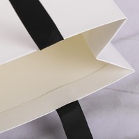 Sac en papier promotionnel personnalisé avec estampage doré texturé et poignées en corde pour diffuseur de parfum, sérum, lotion pour la peau, ornement
