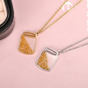 Meetyoo collana pendente rettangolare in acciaio inox alla moda per donne bambini romantiche stile semi di senape collana in resina d'oro - Product Image 3