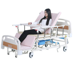 Cama de enfermería manual de acero inoxidable de longitud completa con orificio para inodoro y barandillas para el cuidado de pacientes mayores, uso en dormitorio - Product Image 1