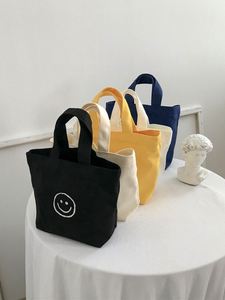 Nouveau sac fourre-tout en toile avec motif visage souriant, simple, polyvalent, artistique, jeune, sac à déjeuner pour femme, usage quotidien - Product Image 3