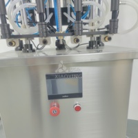 Nouvelle Conception Haute Qualité Traitement Fabrication Parfum Machine de Remplissage de Parfum à 4 Têtes Machine de Remplissage Sous Vide à 4 Buses pour Liquide
