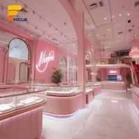 Vitrine à bijoux haut de gamme sur mesure en bois d'ingénierie, comptoir large pour centre commercial, espace de présentation professionnel de bijoux pour la vente au détail