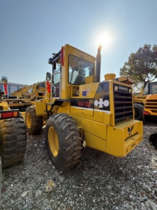 รถตักล้อยางโคมัตสึ WA100 มือสอง 7 ตัน เครื่องยนต์ญี่ปุ่นแท้ ความจุบุ้งกี๋ 1.0-1.6 ลูกบาศก์เมตร  ขายที่ลานเซี่ยงไฮ้ - Product Image 4