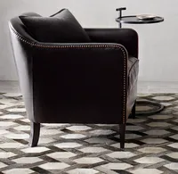 Chaise club en cuir de smoking français des années 1950 inspirée de la campagne de conception Sassanid et de l'ameublement Safari