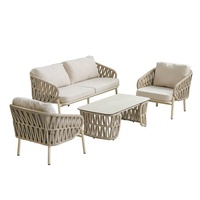 Ensemble de canapés d'extérieur de luxe en aluminium, résistant au soleil et à l'eau, avec tressage en corde et coussins crème pour hôtel, villa, parc, patio