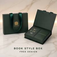 Boîte de luxe personnalisée en forme de livre vert foncé avec poignée en ruban, estampage à chaud, papier rigide, doublure en éponge, emballage cadeau haut de gamme