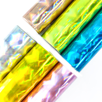 Vente en gros de faux cuir écologique et imperméable en faux cuir synthétique irisé holographique au laser pour sacs de voitures