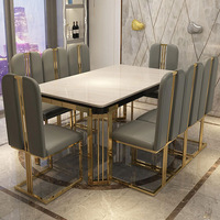 Ensemble de table et chaises de salle à manger de luxe moderne avec plateau en marbre, structure en acier inoxydable, imperméable, design rectangulaire 8 places