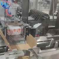 Machine d'emballage intelligente pour cartons enveloppants de canettes de lait et de barils de boissons minérales