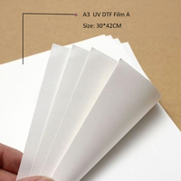 Película PET DTF de gran volumen para transferencia térmica, personalizada, al por mayor, en hojas, lista para prensar, para ropa, bolsos, calzado, prendas de vestir, gorras y guantes, de fábrica