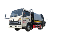 Camion à ordures compacteur Sinotruk Howo de 6 mètres cubes, véhicule de compression des déchets hydraulique léger