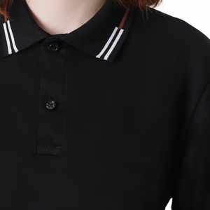 Polo Negro Unisex, Tela Ligera y Transpirable con Elegante Ribete Blanco en el Cuello, Perfecto para Uniformes Escolares o de Negocios - Product Image 1