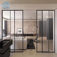 Portes pliantes intérieures modernes en aluminium noir ultra-minces multi-panneaux, résistantes à l'eau, avec verre entièrement transparent, pour appartement, villa, placard