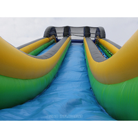 Toboggan aquatique gonflable géant bleu pour adultes de 10 m de haut avec double voie pour les fêtes d'été à la plage et à la piscine