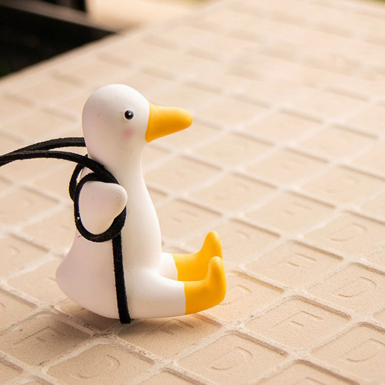 Pendentif Swing Skinny Duck (avec blush)