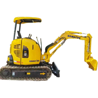 Excavatrice sur chenilles hydraulique d'occasion certifiée CE Komatsu PC20MR-3 avec moteur Komatsu et accessoire tarière pour travaux de terrassement