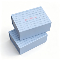 Boîte cadeau personnalisée haut de gamme bleu clair magnétique en forme de livre, recyclable, avec couvercle rigide à rabat et poignée en ruban pour vêtements, petite série