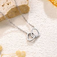 Collier Cœur à Cœur en Acier Inoxydable pour Femme, Design Niche Luxe Léger, Style Sportif en Forme de Cœur, Idéal pour l'Export