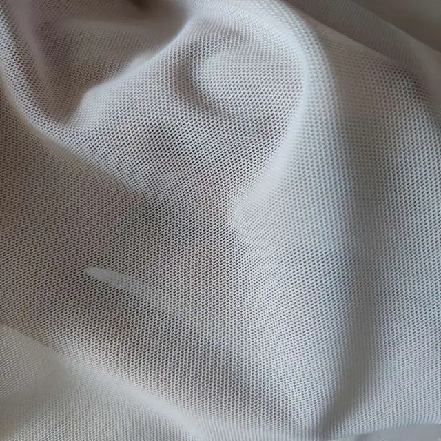 Los fabricantes directos de spandex de poliéster elástico rectangular de malla de tela para la ropa interior de las mujeres ropa deportiva forro