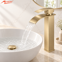 Robinet de lavabo sur pied en acier inoxydable doré poli avec cartouche céramique et bonde escamotable pour salles de bain d'hôtels et d'appartements