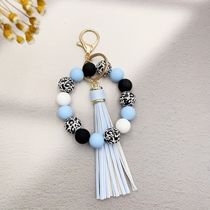 Bracelet créatif en silicone avec des perles rondes en alliage de léopard, impression UV, long pompon doux, cadeau écologique pour hommes et femmes - Product Image 3