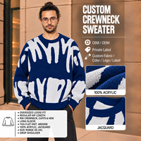 Pull col rond personnalisé bleu marine 100 % acrylique jacquard 7GG 480GSM surdimensionné avec motif graffiti tricoté – Vente en gros