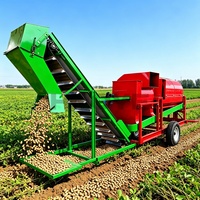 Machine à récolter les arachides montée sur tracteur avec système de nettoyage par ventilateur