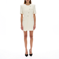 Robe mini élégante pour femme, blazer asymétrique à col rond et manches courtes, boutons sur le devant, poches plaquées, couleur crème, vente en gros sur mesure