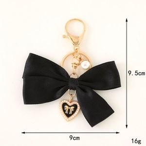Porte-clés élégant en gros avec nœud papillon, magnifique breloque créative, pendentif souple pour sac, cadeaux de festival pour femmes - Product Image 2