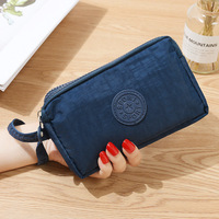 Porte-monnaie en tissu nylon de style coréen pour femmes, design long et tendance, fermeture éclair à trois couches, grande capacité, portable, utilisation quotidienne, téléphone