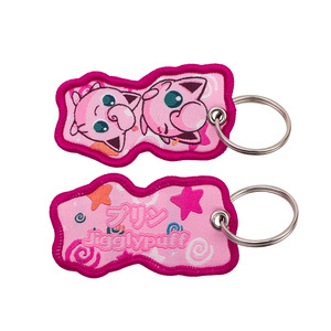 2026 Hot New POKE Monster Custom Wholesale Woven Fabric Double Side Motorcycle Anime logo Cartoon Jet Tags Embroidery Keychain - Product Image 4