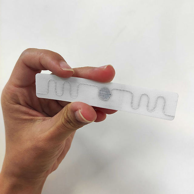 Flexible Washable Tech Fabric RFID Tags Mini UHF Laundry Tags for Linen Textile NFC Communication 860-960MHz Frequency